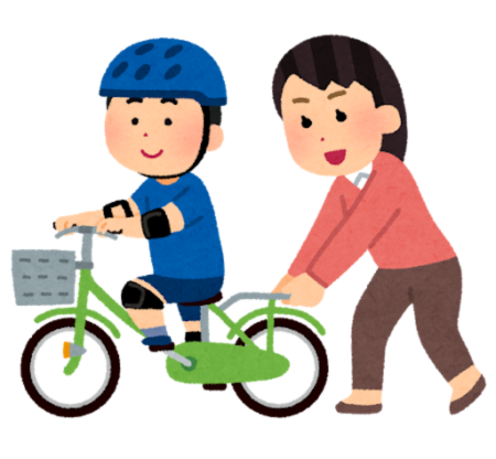 自転車の練習をする男の子